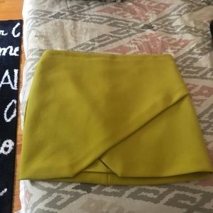 Asymmetrical lime mini skirt
